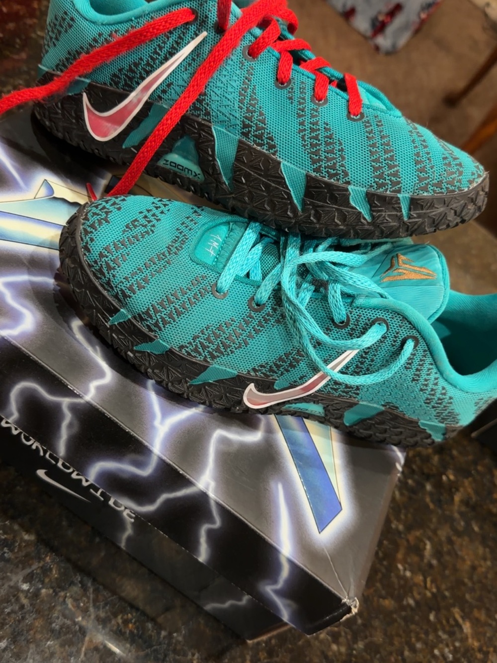 Nike Kids Teal Sneakers with Red Laces
